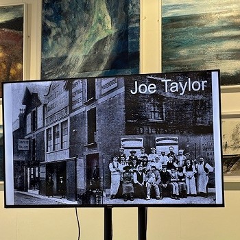 An old image of conwy on a monitor with the text Joe Taylor