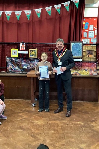 Councillor Antony Bertola with one of the year 6 children