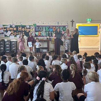 teachers giving students their certificates